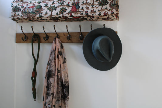 Wall mounted Oak Coat Rack with Antique Style Cast Iron Hooks with Acorn head detail.