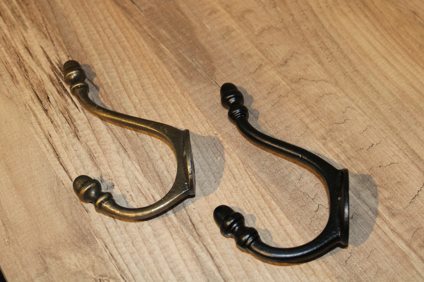 Wall mounted Oak Coat Rack with Antique Style Cast Iron Hooks with Acorn head detail.